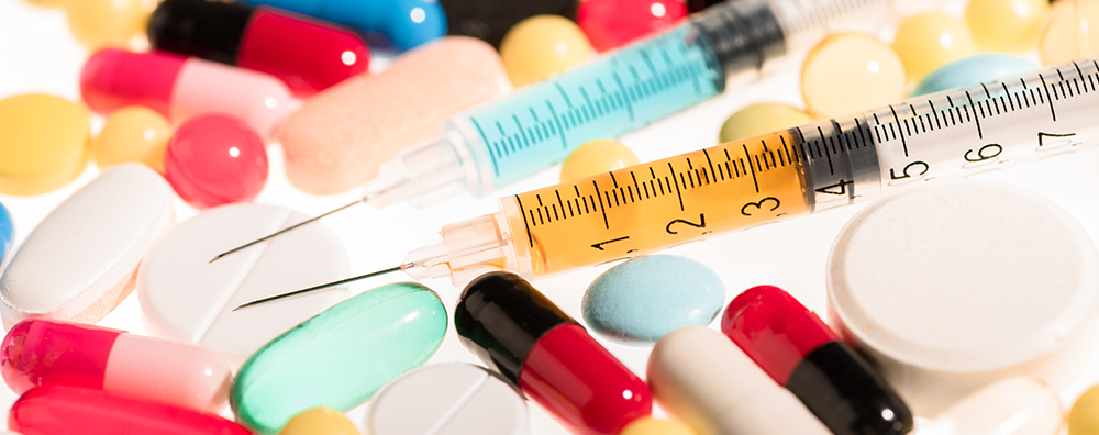 pill and syringe